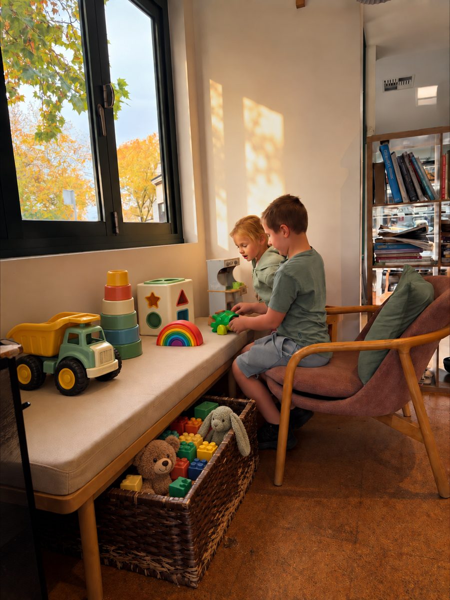 Two children playing in a calm, welcoming room